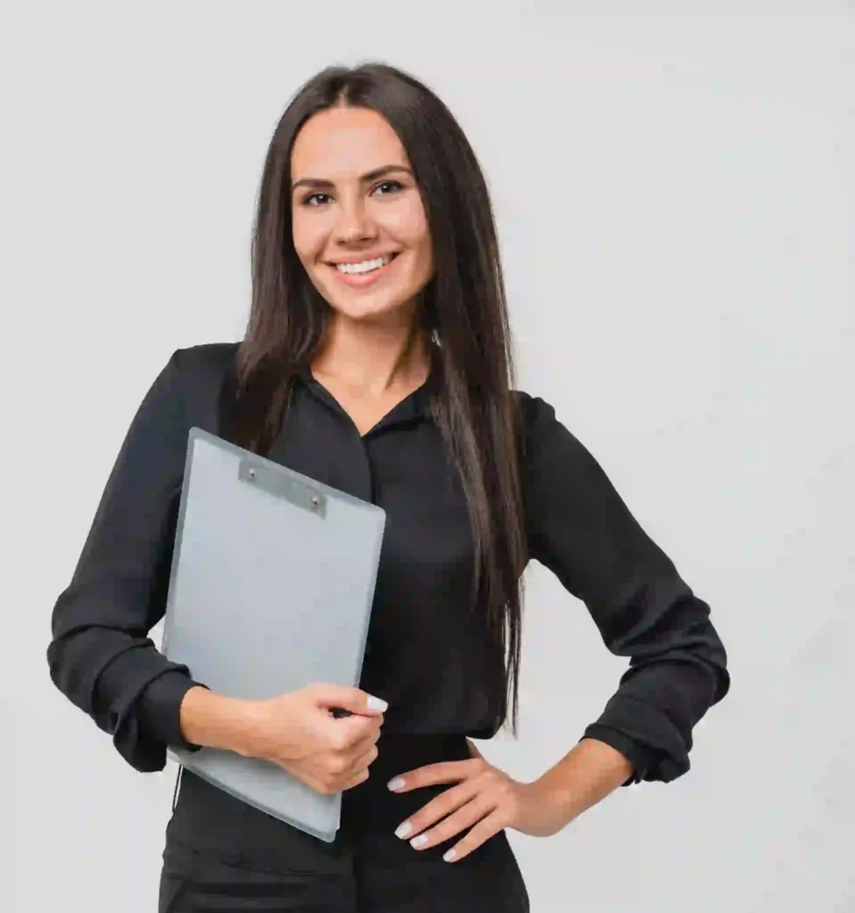 Smiling woman holding a clipboard, black outfit.